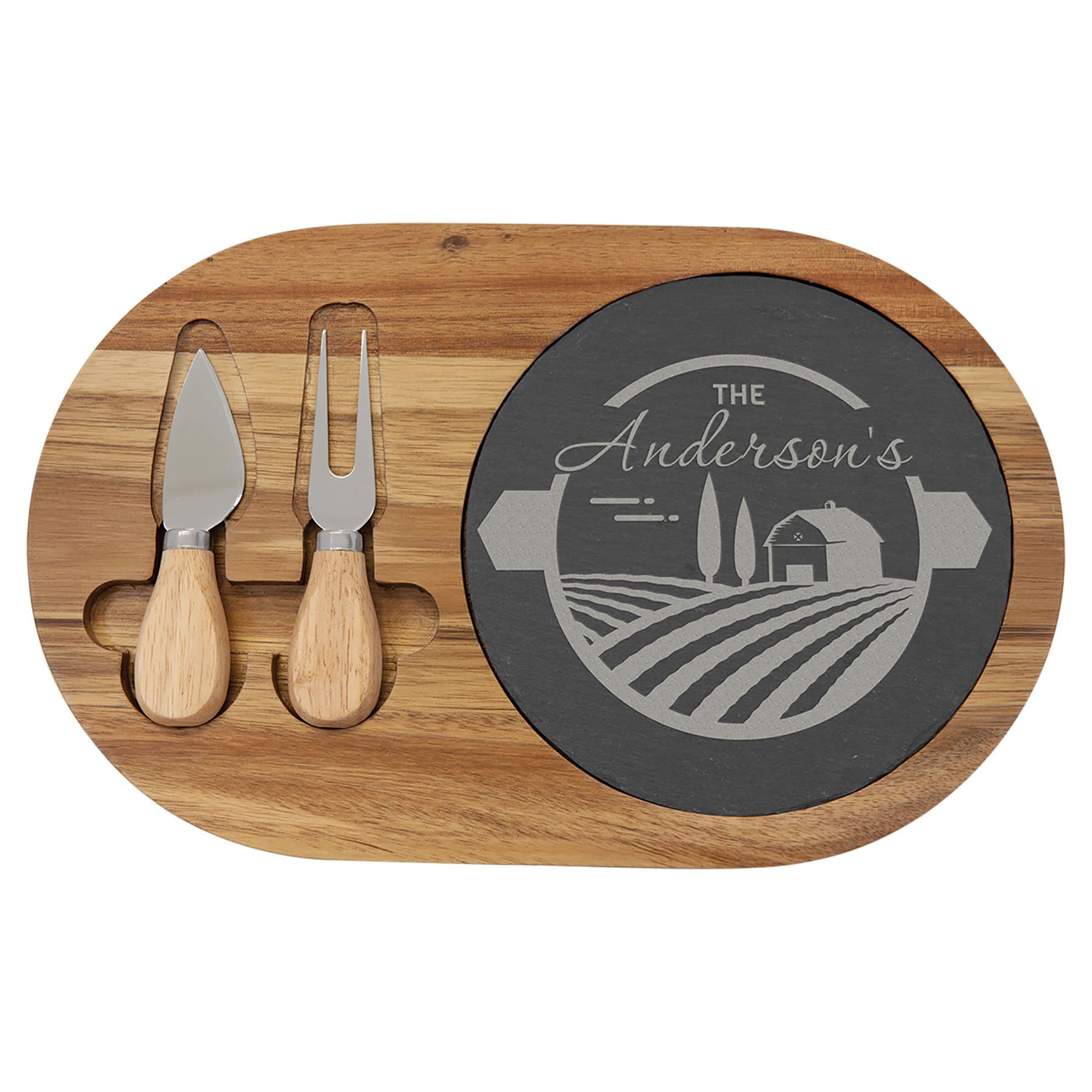 Personalized wooden cheese board featuring a slate section engraved with "The Anderson's" and accompanied by two cheese tools.