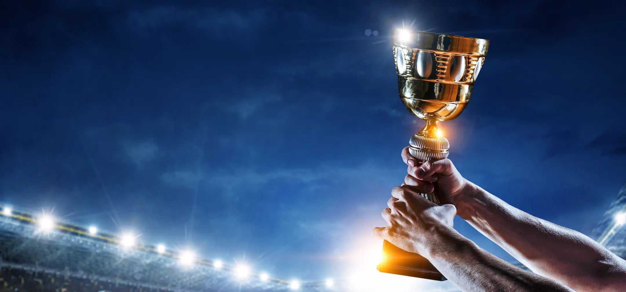 a person winning a trophy